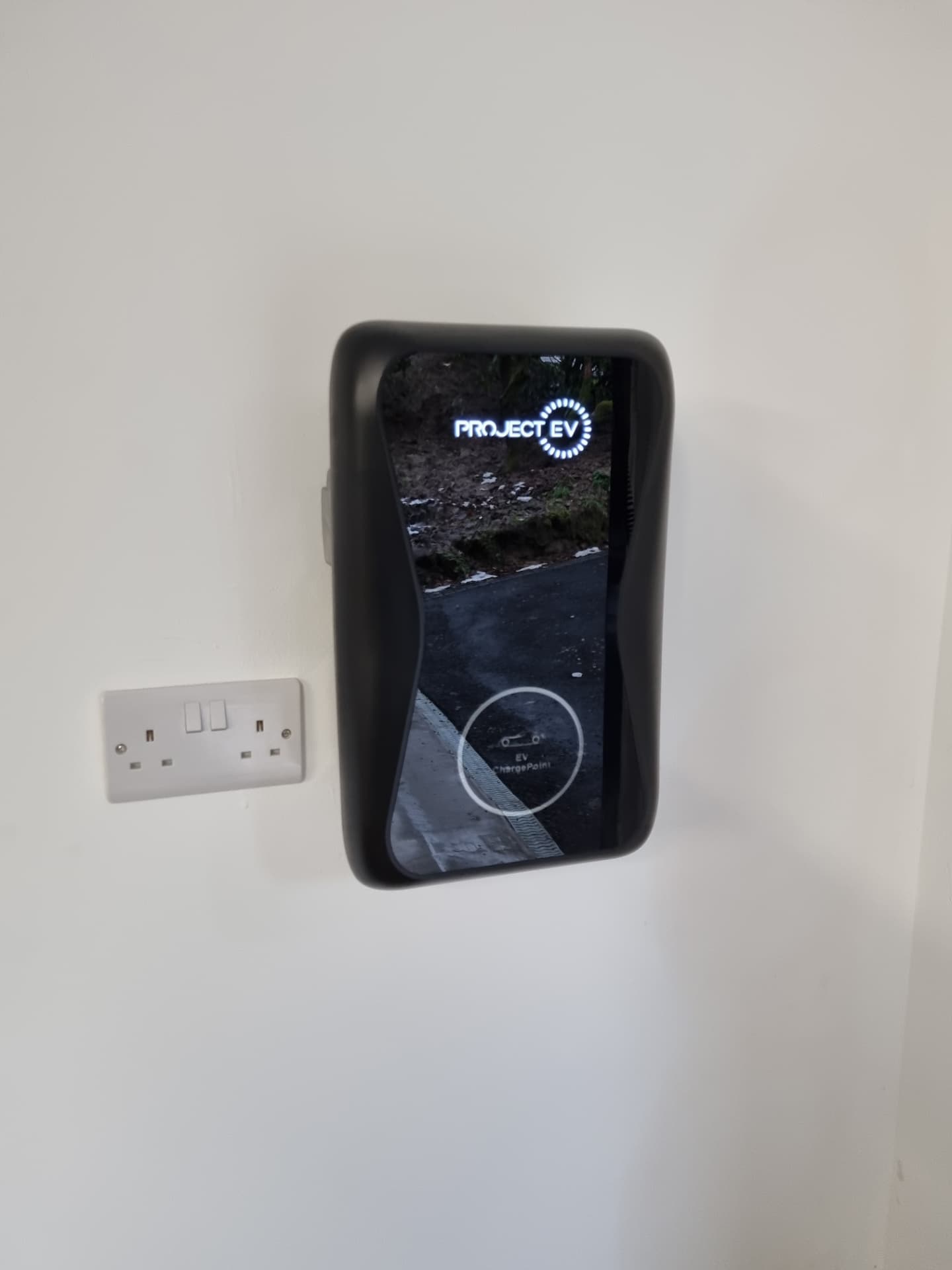 Project EV charge point installed inside a garage